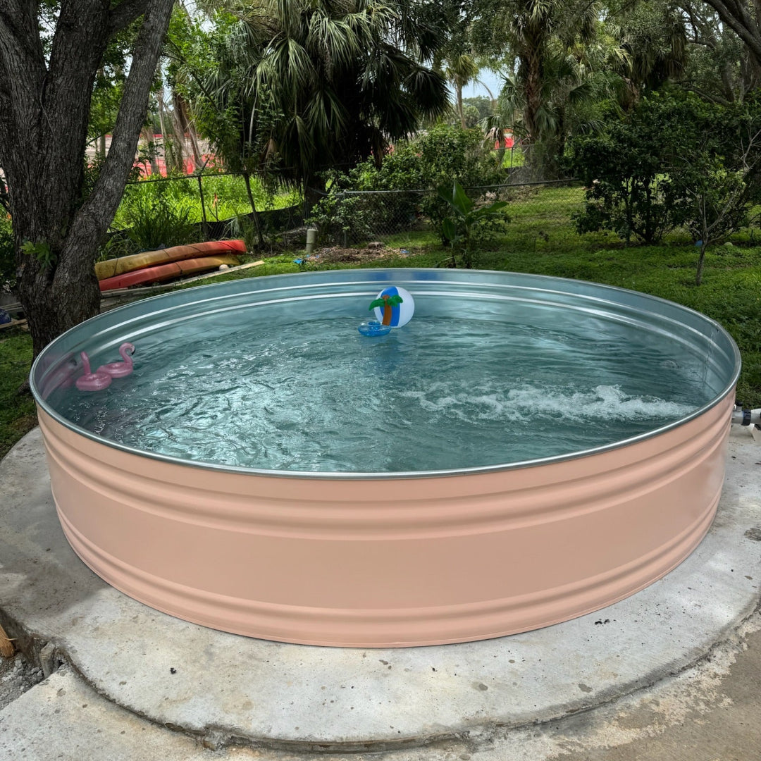 Metallic above-ground pool in a garden setting with children playing.