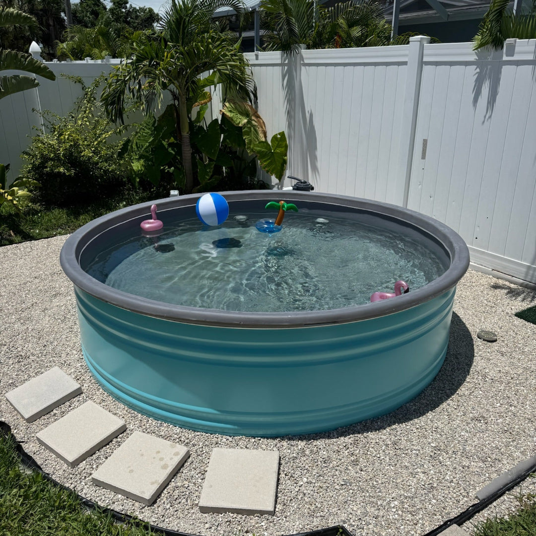 Portable pool with toys in a backyard setting