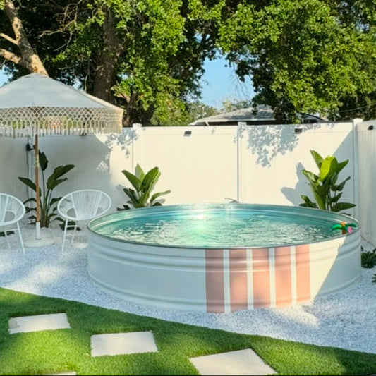 Portable pool in a backyard setting with chairs and plants
